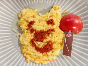 ご飯で形作ったプーさんの顔が崩れる